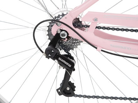 Shimano derailleur system on the Huffy Sienna bike showcasing efficient gear shifting and a rear cassette design. Shimano derailleur system on the Huffy Sienna bike showcasing efficient gear shifting and a rear cassette design.