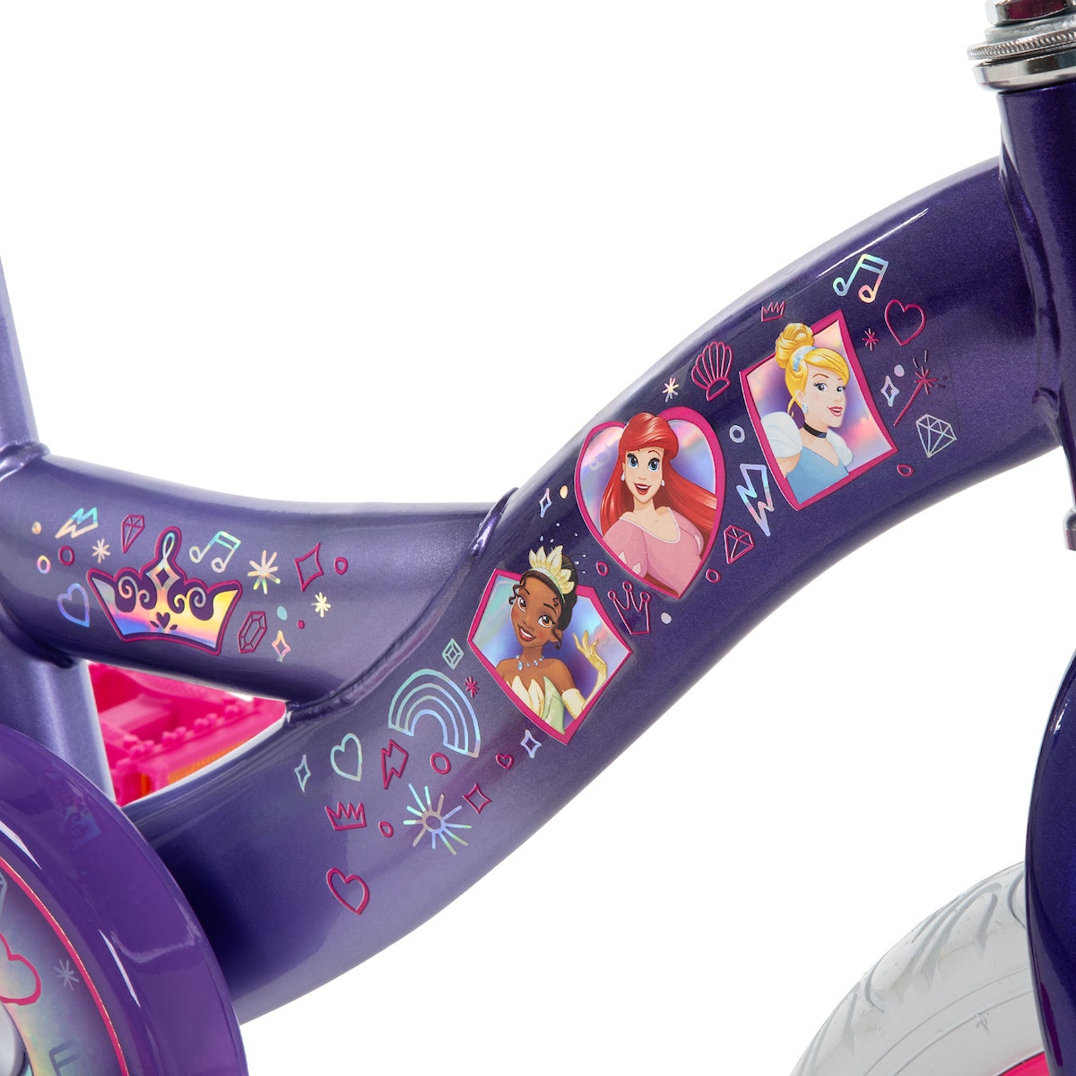 Close-up of a purple kids’ bike frame decorated with Disney Princess graphics of Ariel, Tiana, and Cinderella, plus whimsical icons like hearts, diamonds, and crowns. Close-up of a purple kids’ bike frame decorated with Disney Princess graphics of Ariel, Tiana, and Cinderella, plus whimsical icons like hearts, diamonds, and crowns.