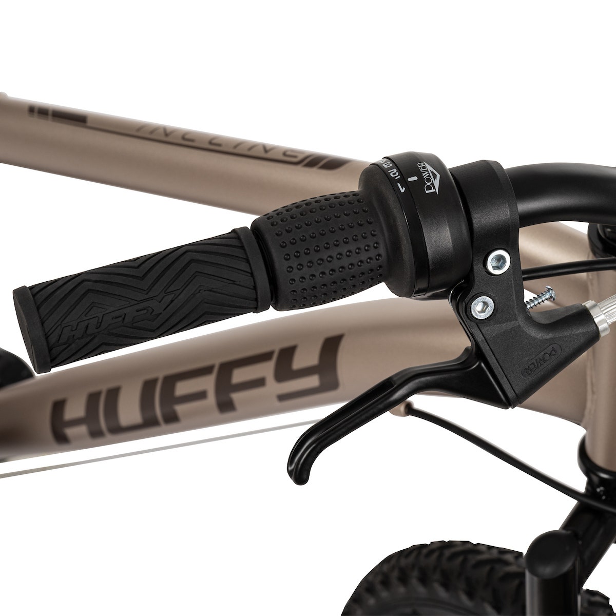 Close-up of a mountain bike handlebar with twist shifter and brake lever. Close-up of a mountain bike handlebar with twist shifter and brake lever.