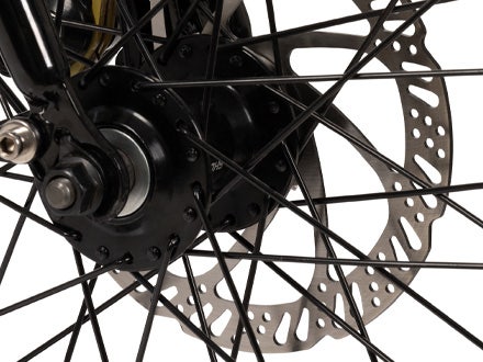 Close-up of the Huffy eThunder Road Electric Bike’s 250W rear hub motor and disc brakes, showcasing its power and reliable stopping capabilities. Close-up of the Huffy eThunder Road Electric Bike’s 250W rear hub motor and disc brakes, showcasing its power and reliable stopping capabilities.