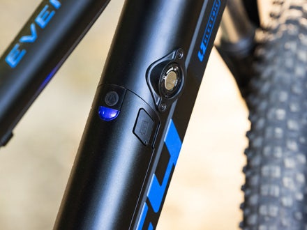 Close-up of the integrated battery on the Huffy Eventis e-bike, showcasing its sleek design, visible charge indicator, and accessible control panel. Close-up of the integrated battery on the Huffy Eventis e-bike, showcasing its sleek design, visible charge indicator, and accessible control panel.