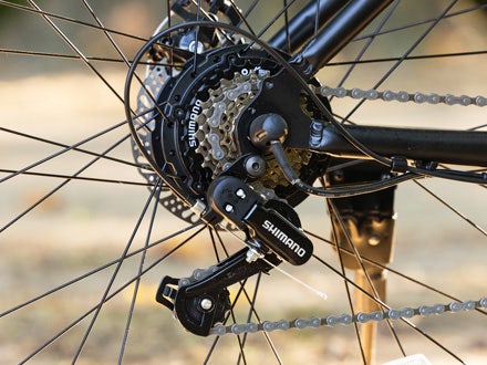 Photo of the Shimano gearing system on the Huffy Eventis e-bike, highlighting its precision engineering and smooth performance for versatile riding. Photo of the Shimano gearing system on the Huffy Eventis e-bike, highlighting its precision engineering and smooth performance for versatile riding.