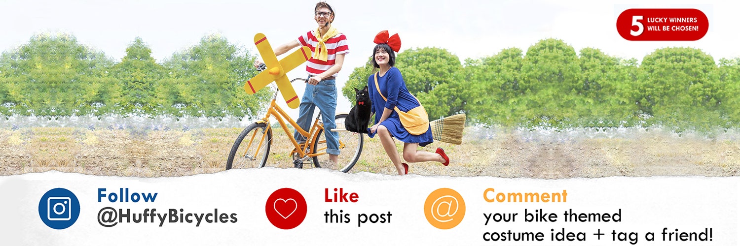 Couple wearing their Halloween costumes riding Huffy Cranbrook cruiser bikes